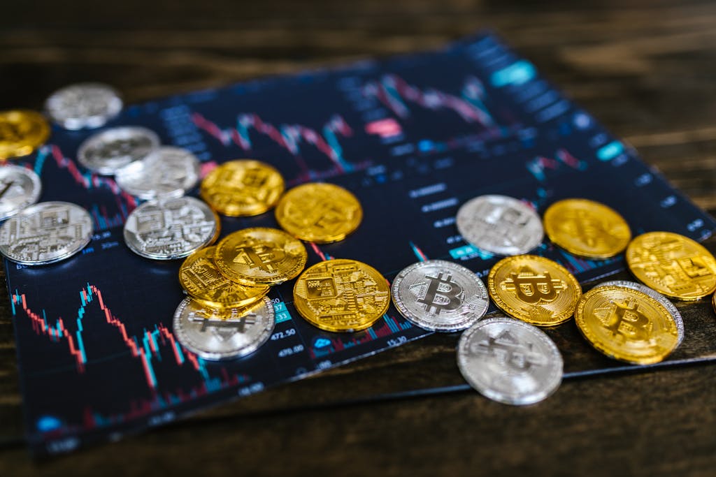 Close-Up Shot of Bitcoins on Wooden Surface